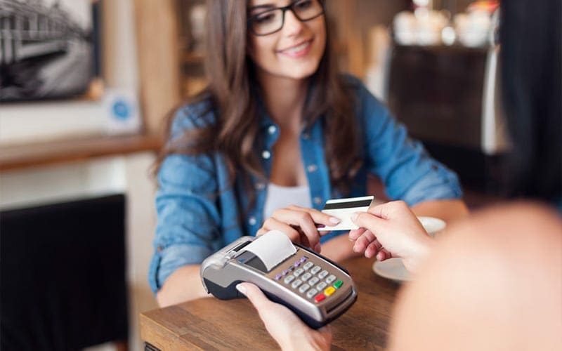 Retail Customer Paying with Point-of-Sale Credit Card