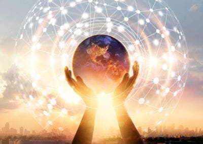 Hands touching earth and circle global network connection