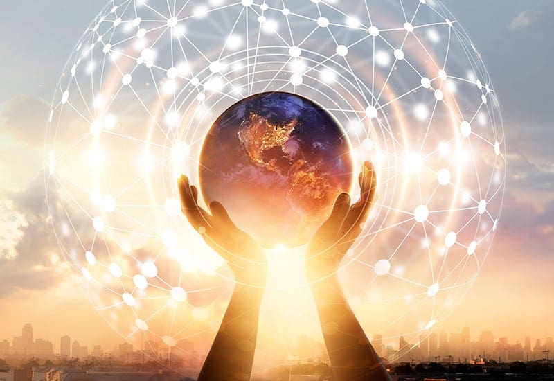 Hands touching earth and circle global network connection